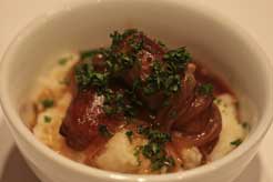 Mini Cumberland Sausages on Creamy Mash with Onion Gravy