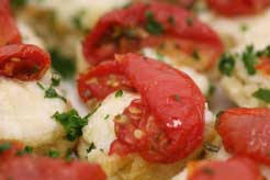 Rosemary Scones topped with Mascarpone and Sun blush Tomatoes