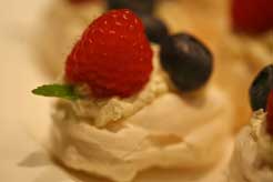 Mini Pavlovas with Raspberry, Blueberry, and Fresh Cream